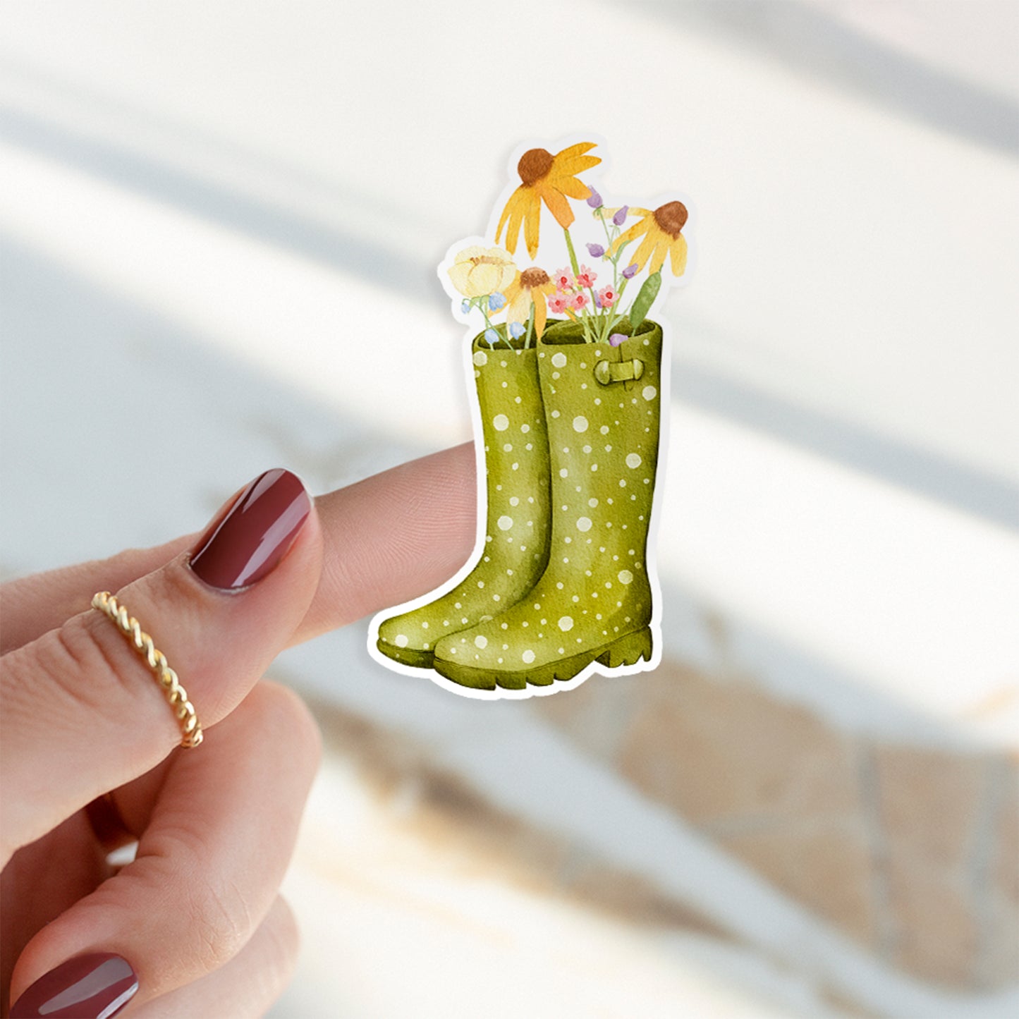 Sticker Wildblumen auf Finger, zeigt grüne Stiefel mit Blumen. Handgefertigter Vinyl-Aufkleber, langlebig und spritzfest, ideal für Bullet Journals und Geschenke.