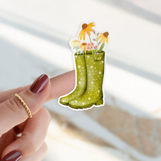 Sticker Wildblumen auf Finger, zeigt grüne Stiefel mit Blumen. Handgefertigter Vinyl-Aufkleber, langlebig und spritzfest, ideal für Bullet Journals und Geschenke.