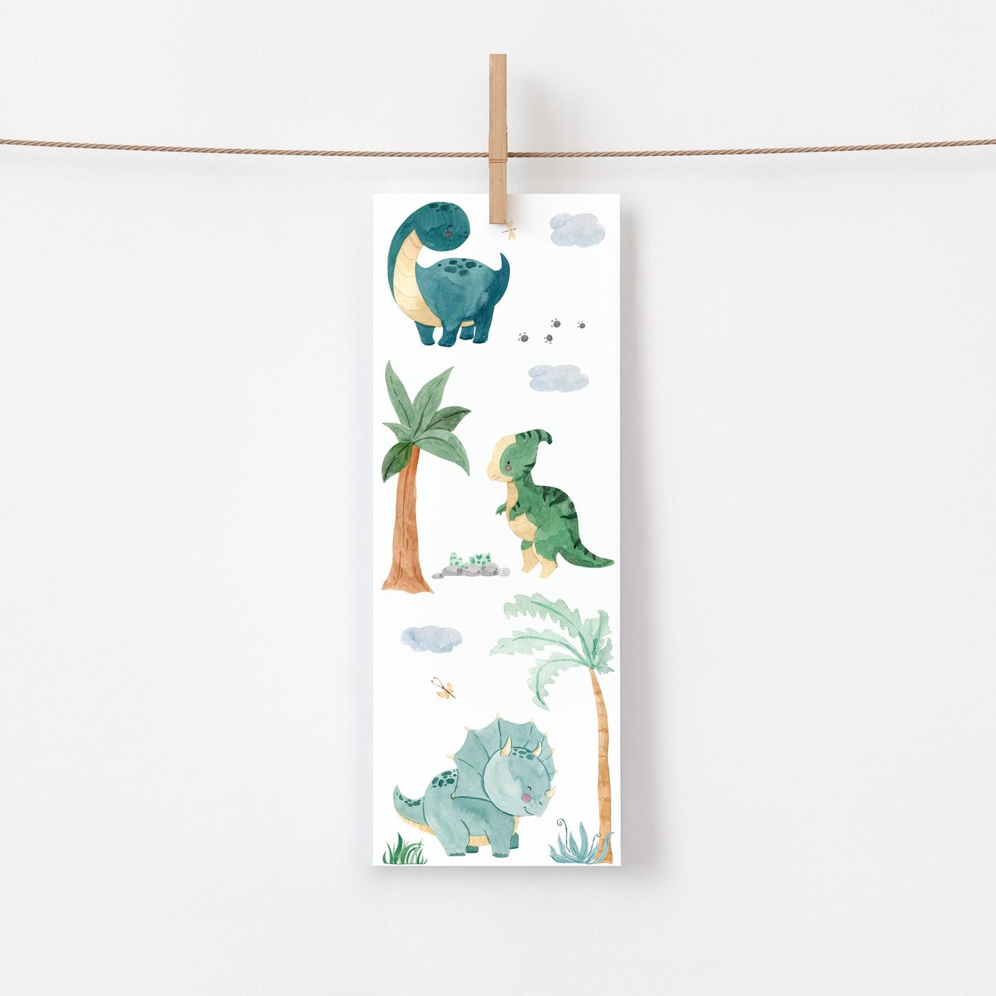 Einschulung Geschenk-Set Dinosaurier: Ein Lesezeichen mit Dinosaurier-Illustrationen, perfekt für den Schulstart. Teil eines 11-teiligen Sets mit weiteren Dino-Produkten.