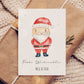 Personalisierte Weihnachtskarte Weihnachtsmann A6 mit Santa-Illustration, kraftverpackt. Text: Frohe Weihnachten, Namen NELE & FELIX. Ideal für Kinder und Familie, handgemalt, hochwertig gedruckt.