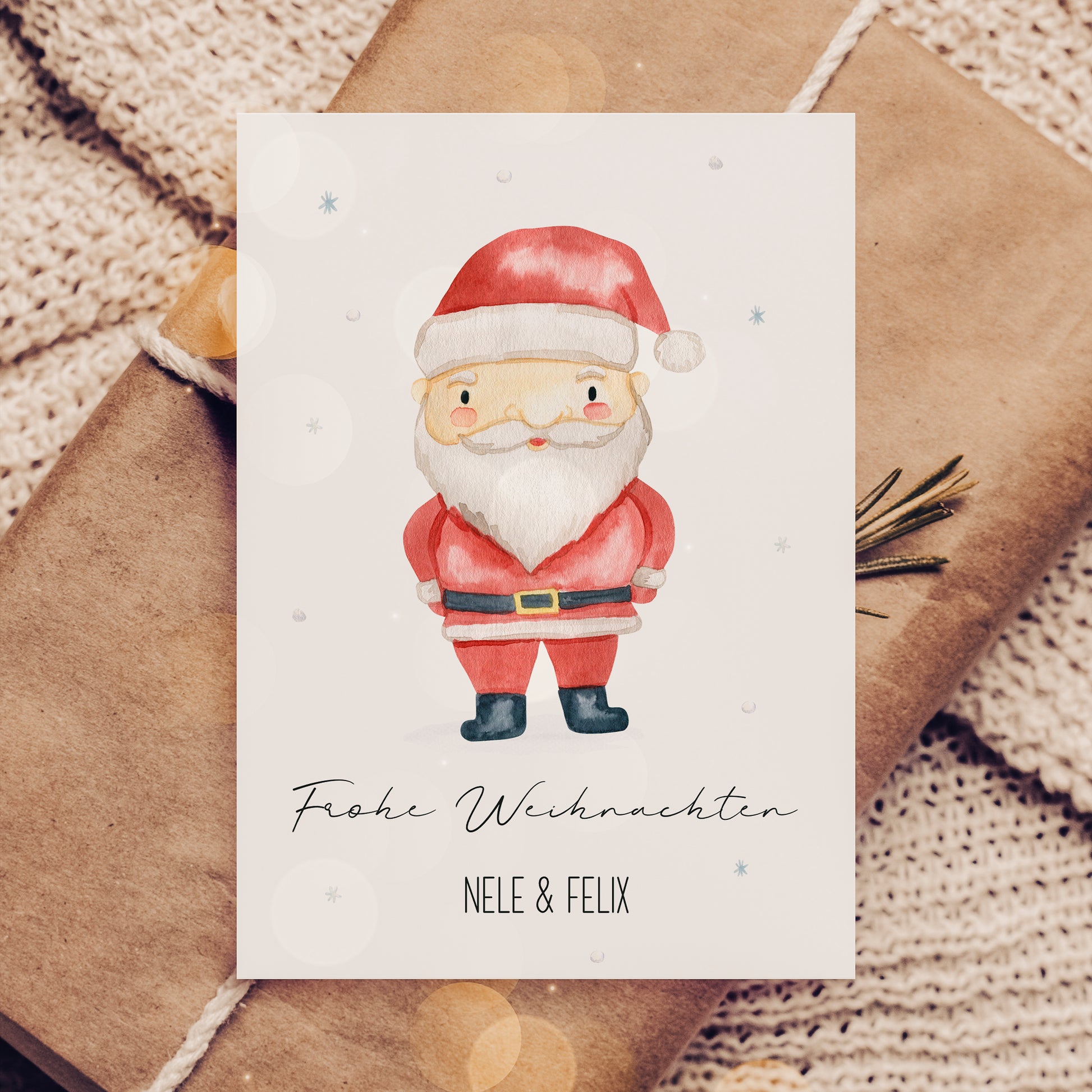 Personalisierte Weihnachtskarte Weihnachtsmann A6 mit Santa-Illustration, kraftverpackt. Text: Frohe Weihnachten, Namen NELE & FELIX. Ideal für Kinder und Familie, handgemalt, hochwertig gedruckt.
