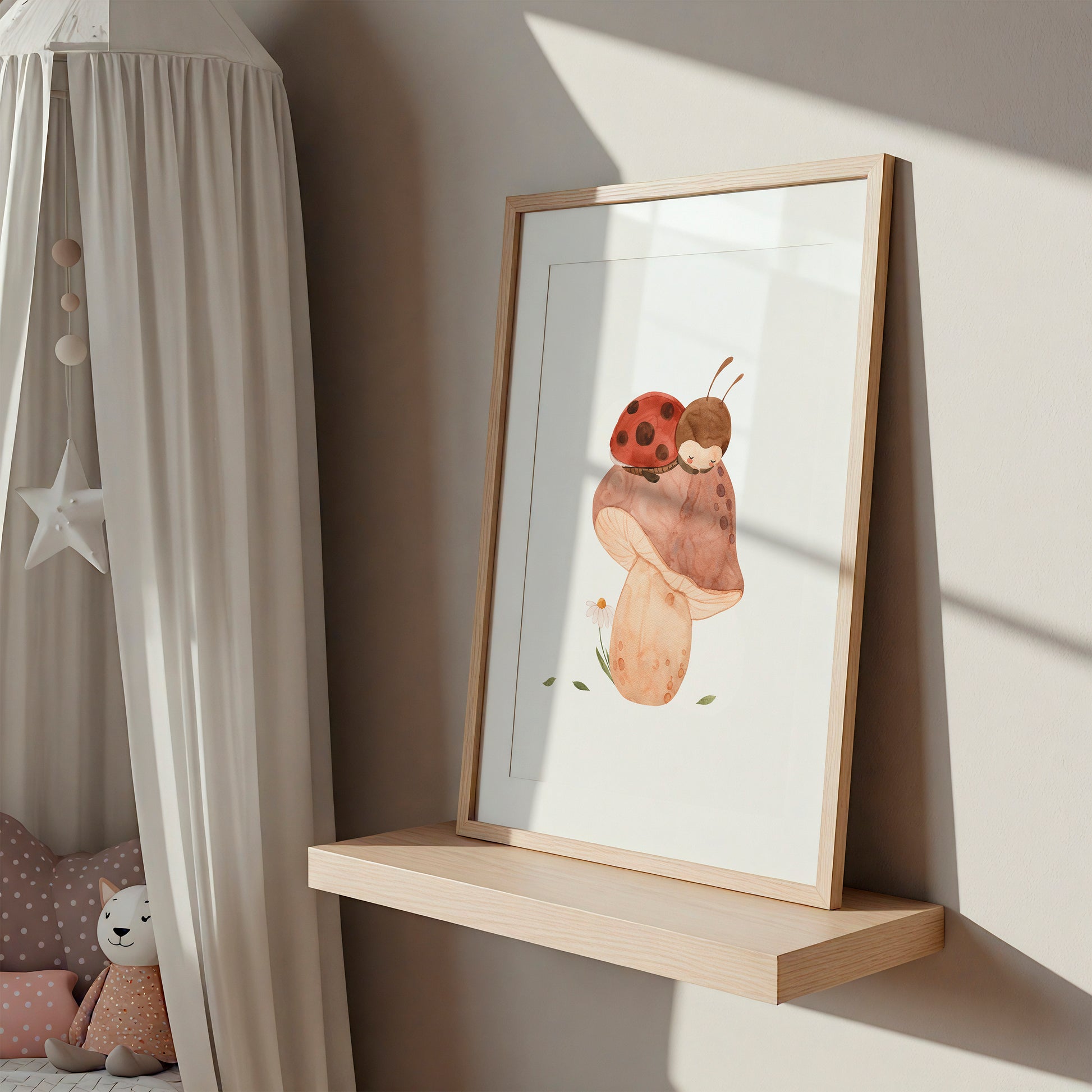 Namensposter personalisiert 3er Set Marienkäfer A5, A4 & A3: Framed watercolor of a mushroom with sleeping ladybug critter on a light-wood shelf. Cozy nursery decor.