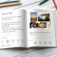 Reisetagebuch Glücksabenteuer A5 Hardcover: Ausgefüllt und mit Bildern. Bleistifte auf einem Tisch. Zum Planen und Festhalten von Reiseerinnerungen.
