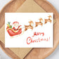 Weihnachtskarte Weihnachtsschlitten Merry Christmas A6: Liebevoll gestaltete Karte mit Santa Claus und Rentieren, auf hochwertigem, mattem Naturpapier gedruckt.