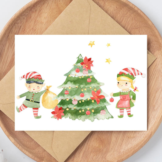 Weihnachtskarte Elfen & Weihnachtsbaum A6, Weihnachtsbaum und Elfen Aquarellillustration, gedruckt auf hochwertigem, stabilem 300g Naturpapier.