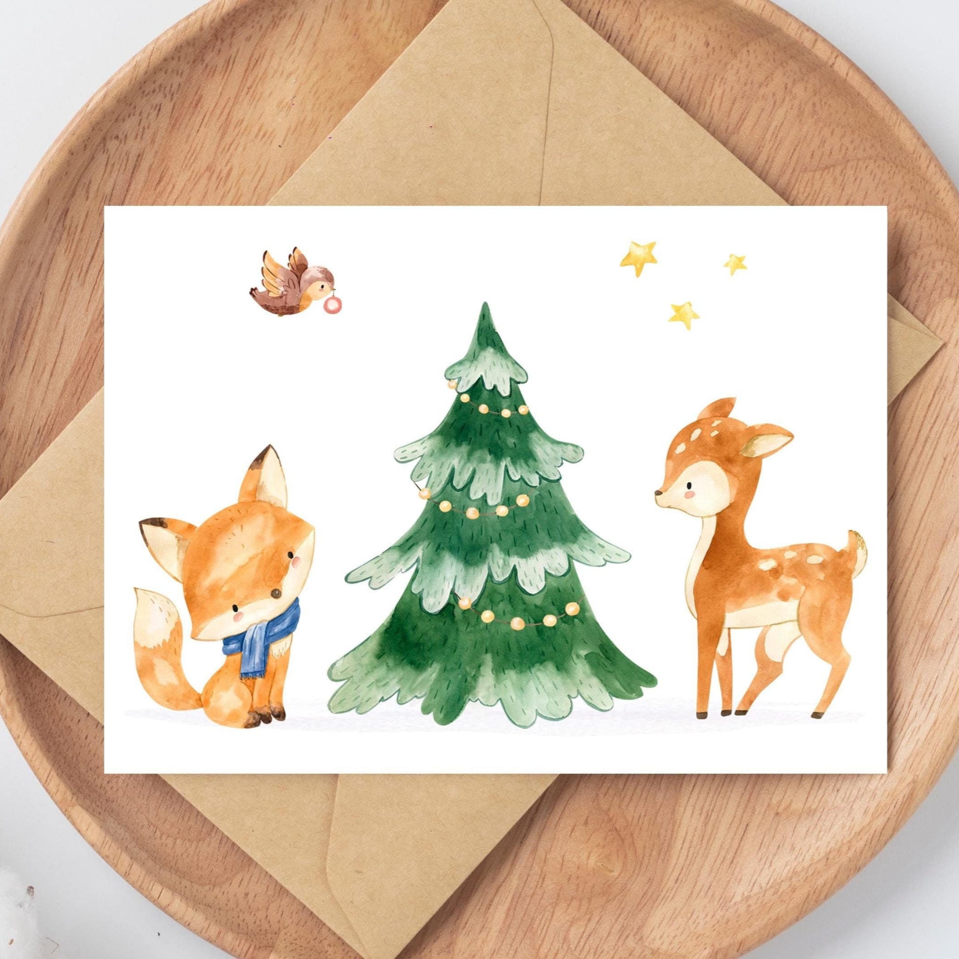 Weihnachtskarte Reh & Fuchs A6 mit Aquarellillustrationen von einem Baum, Fuchs und Reh auf hochwertigem Naturpapier, perfekt für Weihnachtsgrüße.