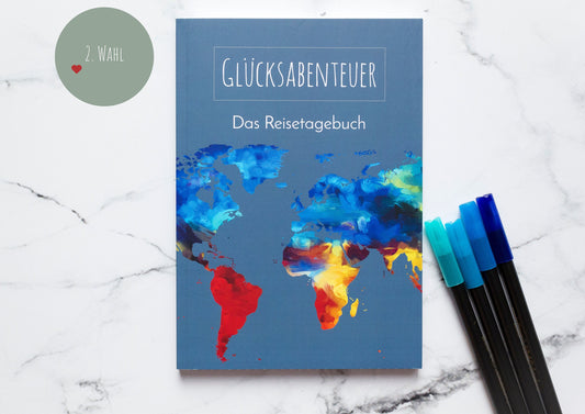 Reisetagebuch A5 Softcover Notizbuch für Reisen mit bunter Weltkarte auf dem Cover, ideal zum Planen, Notieren und Gestalten von Reiserinnerungen.