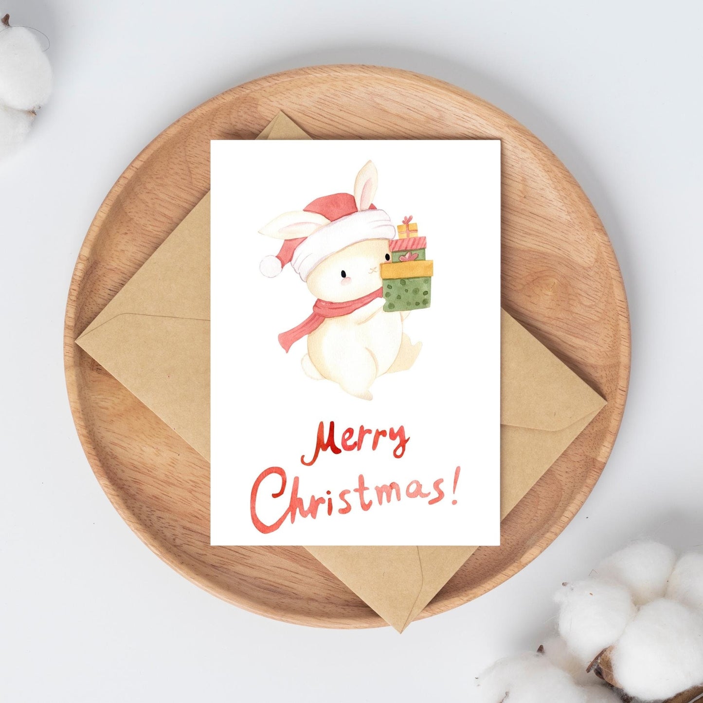 Weihnachtskarte Hase & Geschenke Merry Christmas A6, Illustration, Hasen mit Geschenken, Merry Christmas Schriftzug, auf hochwertigem Naturpapier, perfekt für Weihnachtsgrüße.