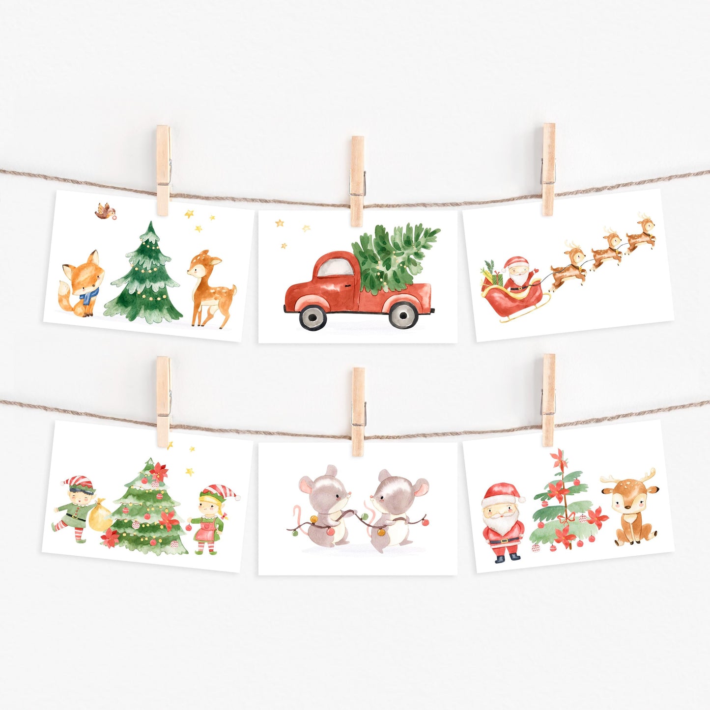 Weihnachtskarten-Set 6 Karten Weihnachtsabend A6: sechs A6-Weihnachtskarten mit Aquarellmotiven, darunter Weihnachtsbaum, roter Truck, Rentier, Maus und Weihnachtsmann.