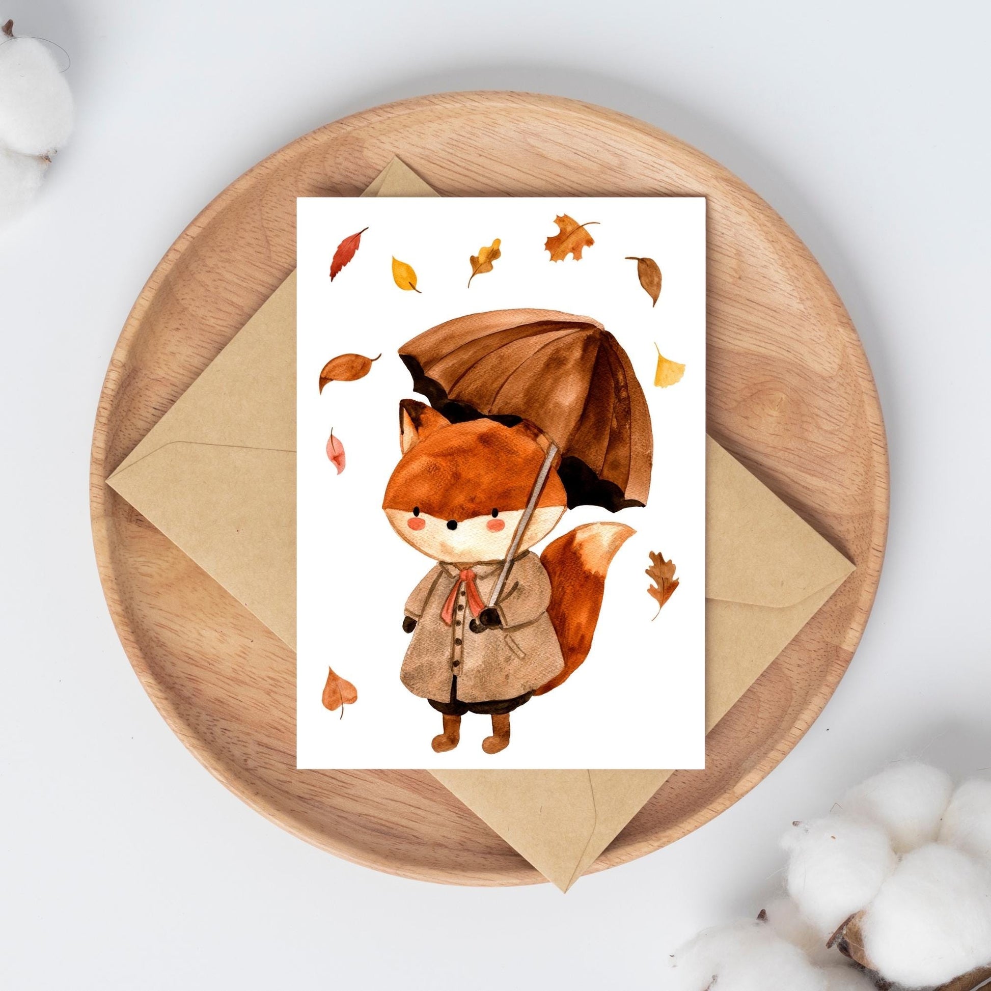 Karte Füchsin & Herbstlaub A6: Illustrierte Postkarte mit Fuchs, Schirm und Herbstlaub auf hochwertigem, mattem 300g Naturpapier. Perfekt für Grüße oder Herbstdekoration.