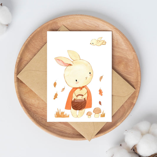 Karte Hase & Herbstwald A6: Eine Postkarte mit einem niedlichen Hasen und Herbstwald-Motiv, auf hochwertigem Naturpapier gedruckt. Perfekt für liebe Grüße.