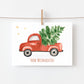 Weihnachtskarte A6 mit Aquarellmotiv: roter Truck transportiert Weihnachtsbaum, Schriftzug Frohe Weihnachten. Hochwertiges, mattes Naturpapier, beschreibbare Rückseite.