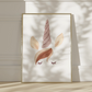 Poster mit handgemalter Silhouette von Einhorn. Gerahmt an eine Wand gelehnt